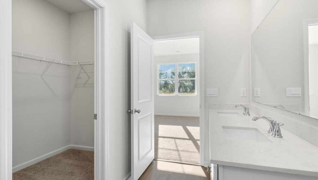 Representative furnished interior of a home built from the KERRY by D.R. Horton in Cedar Hill Landing, Navassa (Image 10).