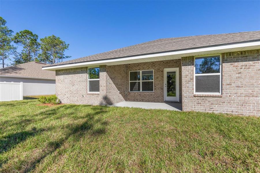 Exterior details and patio area of a home in Palm Coast, Palm Coast (Image 3).