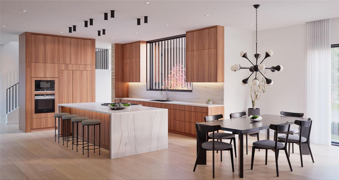 Kitchen featuring modern cabinets, a kitchen breakfast bar, light wood-style flooring, and a center island