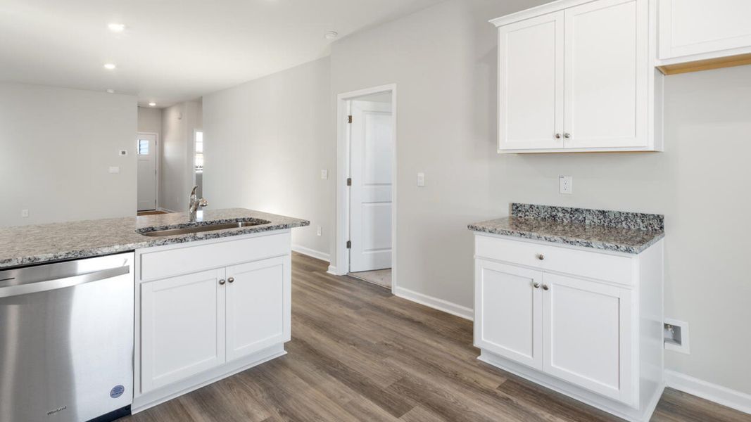 Representative furnished interior of a home built from the DELANEY by D.R. Horton in The Cottages at Blake Farm, Wilmington (Image 15). Representative furnished interior of a home built from the DELANEY by D.R. Horton in The Cottages at Blake Farm, Wilmington (Image 15).