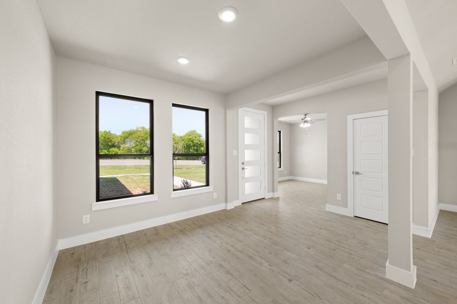 Front exterior of a new home in Carrera Ranch, Waxahachie, TX, highlighting curb appeal (Image 20).