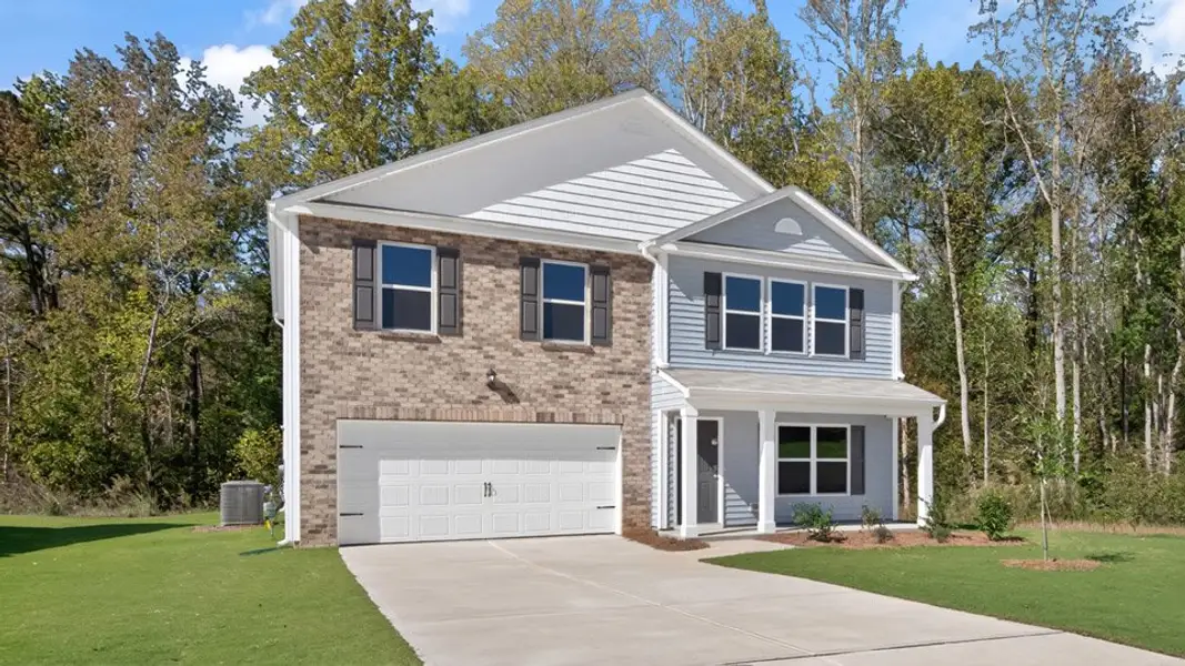 Front exterior of a new home in Blair Ridge, La Grange, NC, highlighting curb appeal (Image 2). Front exterior of a new home in Blair Ridge, La Grange, NC, highlighting curb appeal (Image 2).
