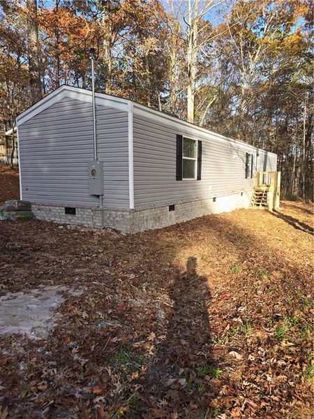 Exterior details and patio area of a home in , Ellijay (Image 10).