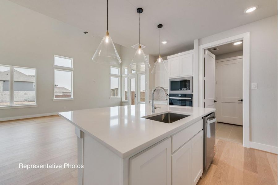 Representative furnished interior of a home built from the Royal Catherine IV by Grand Homes in Edgewater, Fate (Image 7).