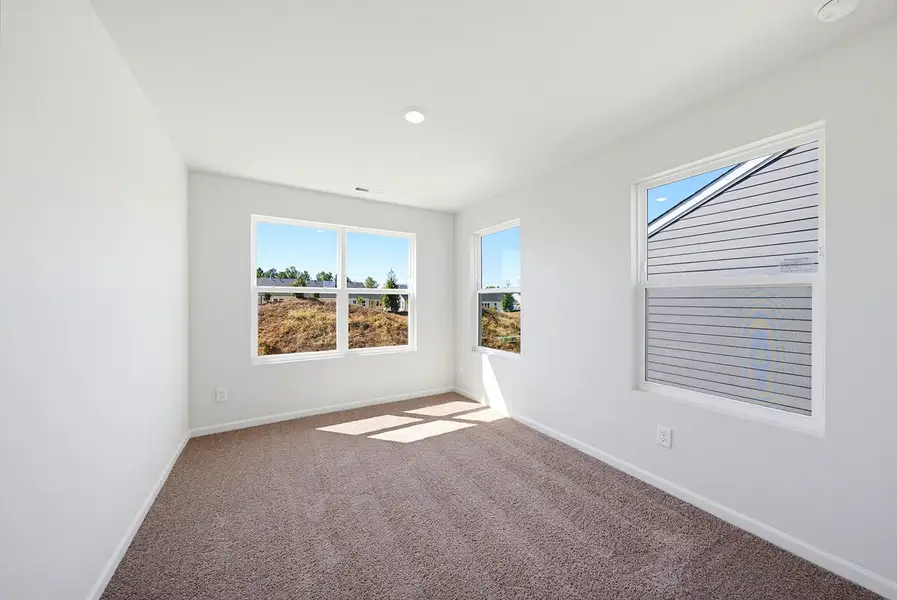 Spacious, unfurnished interior of a new home in Sweetbrier, Durham (Image 27).