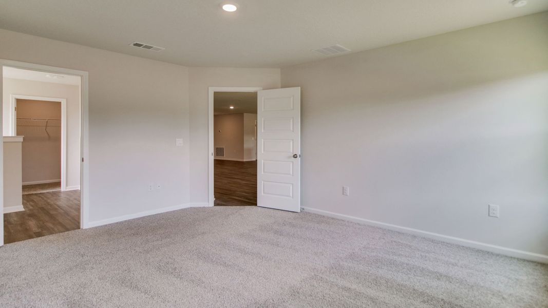 Spacious, unfurnished interior of a new home in The Enclave at Bar W Ranch, Baker (Image 21).