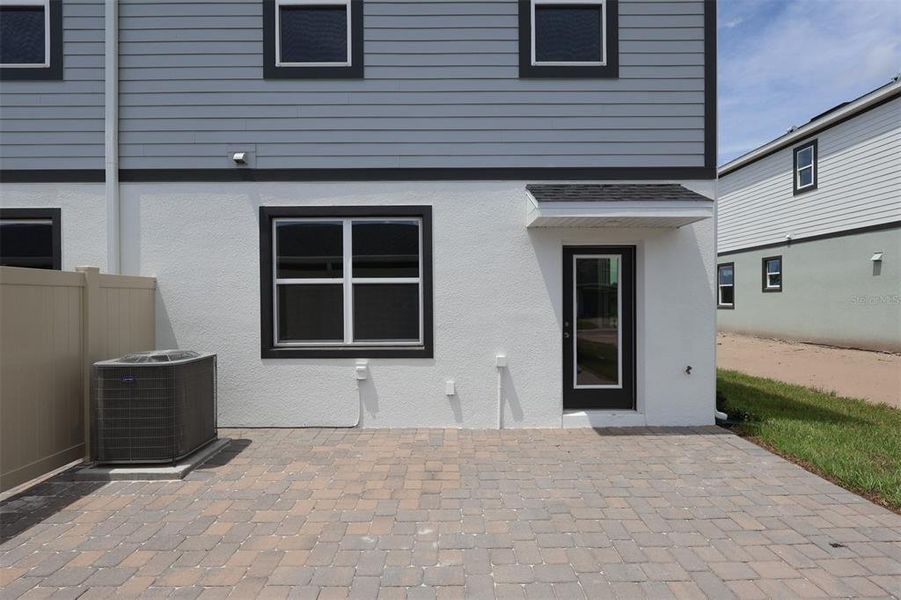Exterior details and patio area of a home in Center Lake on the Park, St. Cloud (Image 3).