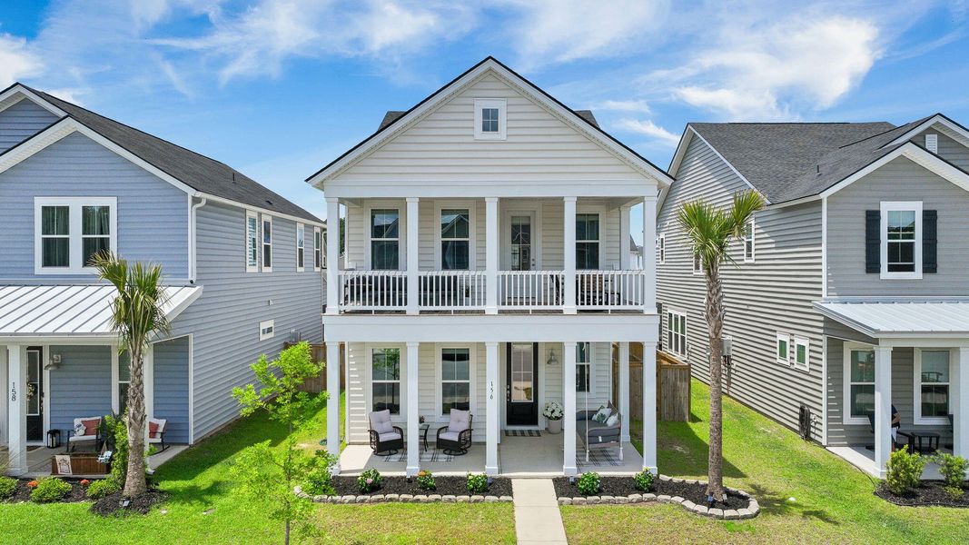 Front exterior of a new home in Heron's Walk at Summers Corner, Summerville, SC, highlighting curb appeal (Image 27).