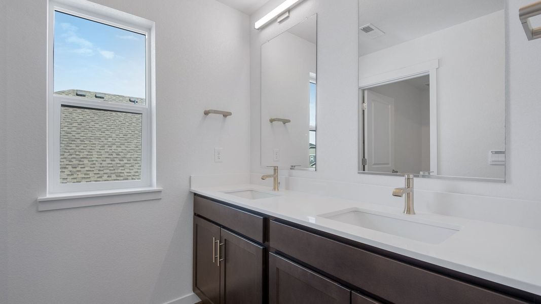 Furnished interior view inside a new home in Trails at Crowfoot, Parker (Image 17).