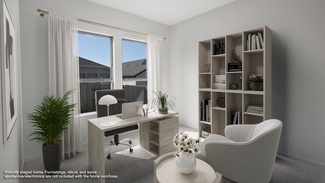 Carpeted office with baseboards