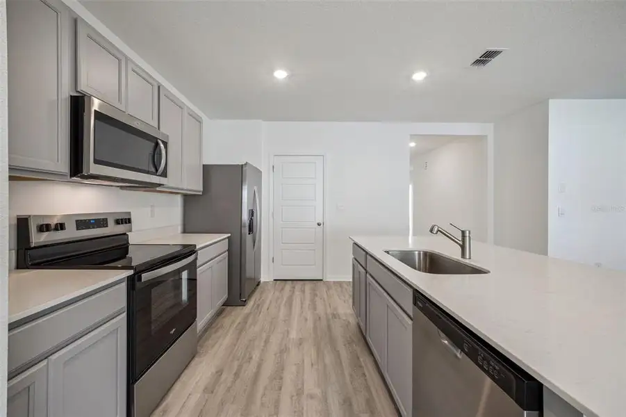 Furnished interior view inside a new home in , Tavares (Image 8).