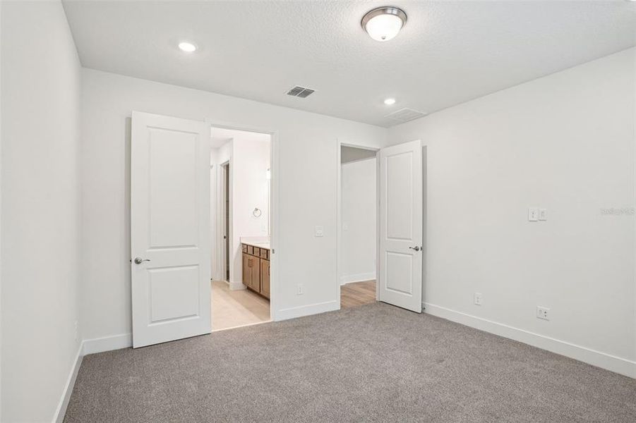 Spacious, unfurnished interior of a new home in Ridgehaven - Signature Series, Ormond Beach (Image 32).