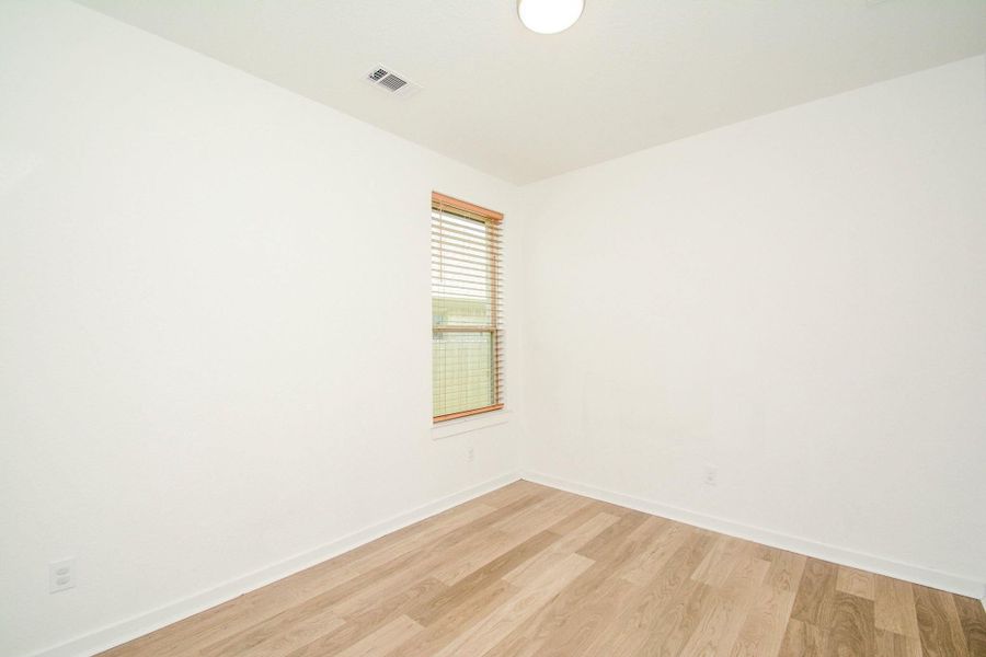 Additional bedroom ideal for a nursery, office, or hobby room. Additional bedroom ideal for a nursery, office, or hobby room.