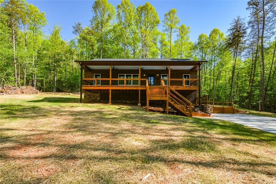 Exterior details and patio area of a home in , Ellijay (Image 23).