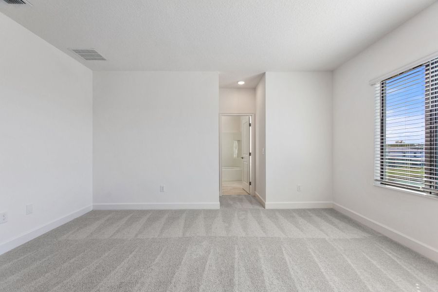 Representative unfurnished interior of a home built from the Oceanside by Park Square Residential in Paradiso Grande, Orlando (Image 33).