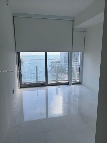Spacious, unfurnished interior of a new home in Aston Martin Residences, Miami (Image 53).