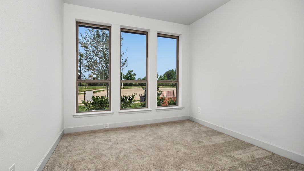 Spacious, unfurnished interior of a new home in Lakes of Cane Island, Katy (Image 21).