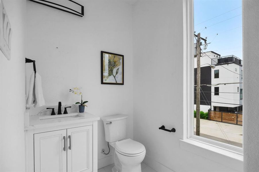 Bathroom with vanity and toilet