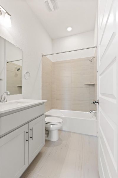 Bathroom with tub / shower combination and vanity