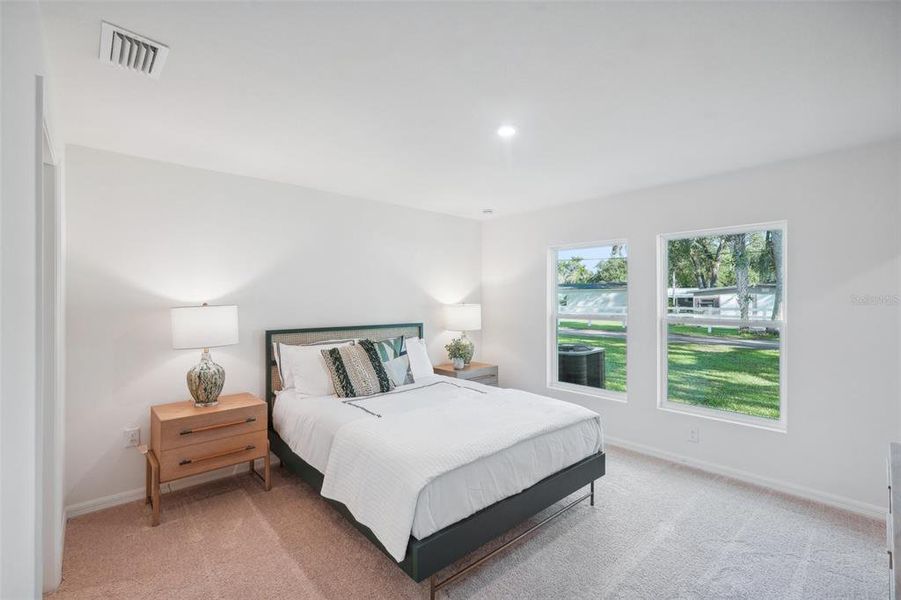 Furnished interior view inside a new home in Eagle Hammock, Eagle Lake (Image 12).