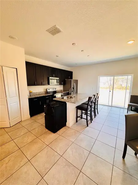 Furnished interior view inside a new home in , Ocala (Image 7).
