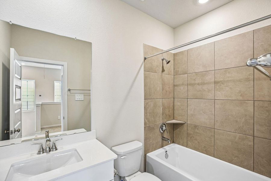 Furnished interior view inside a new home in Kemah Crossing - City Series, Kemah (Image 14).