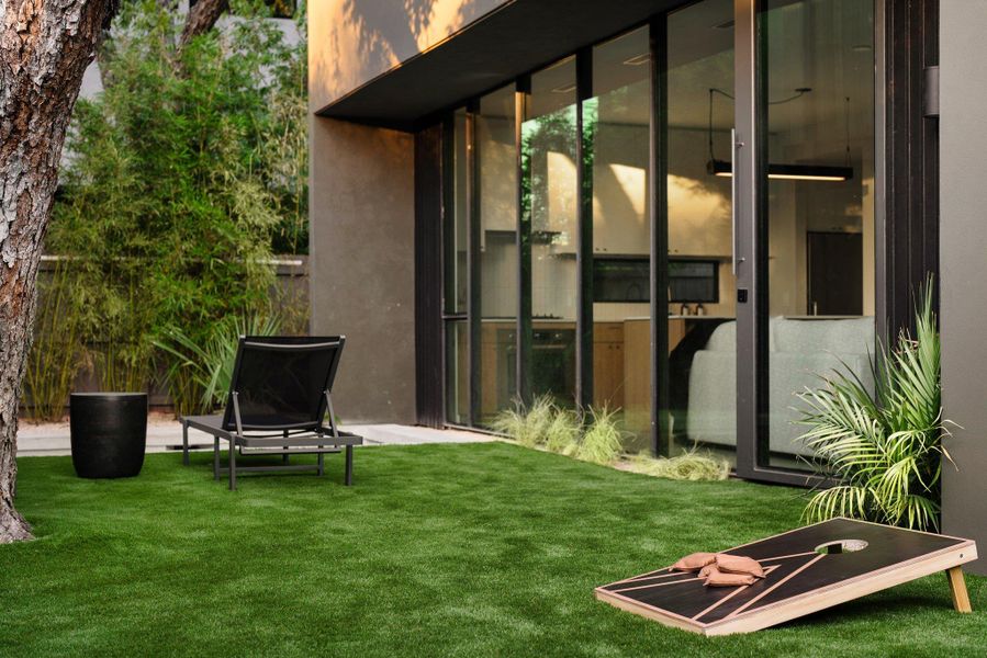 Exterior details and patio area of a home in , Austin (Image 14). Exterior details and patio area of a home in , Austin (Image 14).
