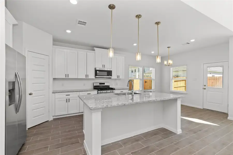 Furnished interior view inside a new home in Harmony Cove, Humble (Image 10).