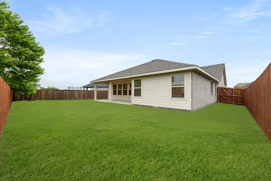 Representative exterior photo of a completed home built from the Austin by Impression Homes in DeBerry Reserve, Royse City, TX (Image 25). Representative exterior photo of a completed home built from the Austin by Impression Homes in DeBerry Reserve, Royse City, TX (Image 25).