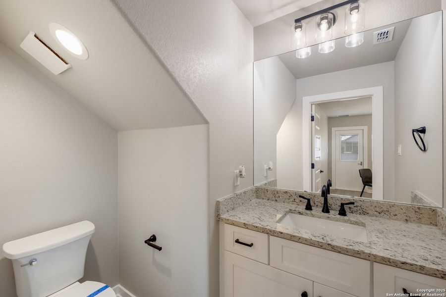 Furnished interior view inside a new home in , Lakehills (Image 13).