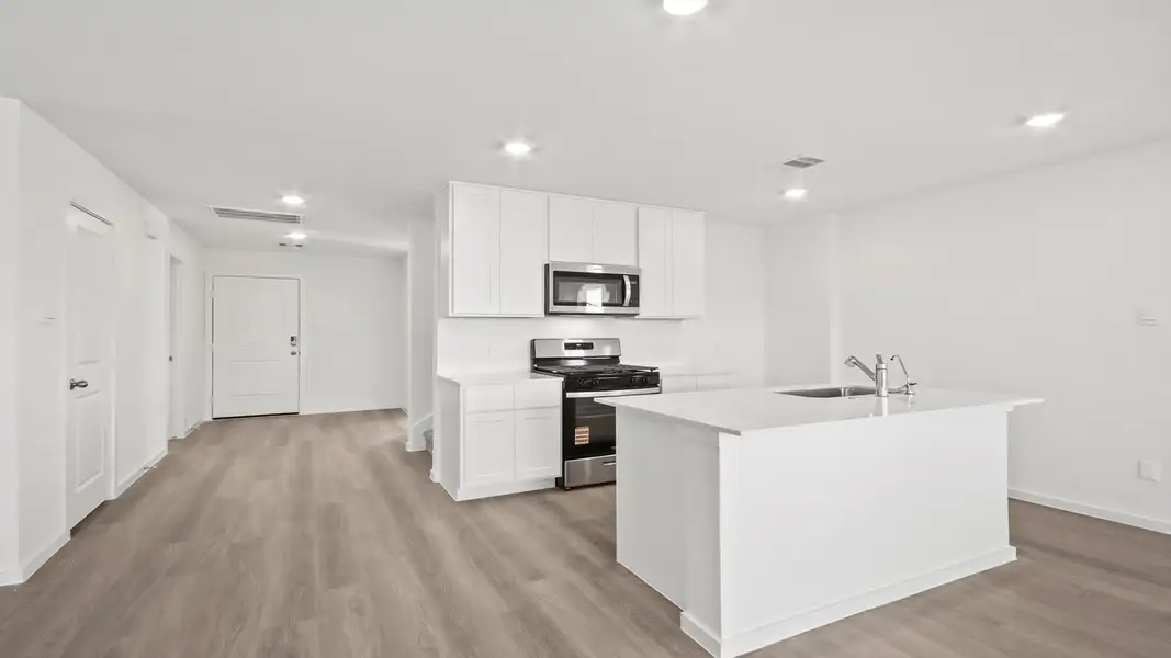 Furnished interior view inside a new home in Lexington Heights, Willis (Image 7).