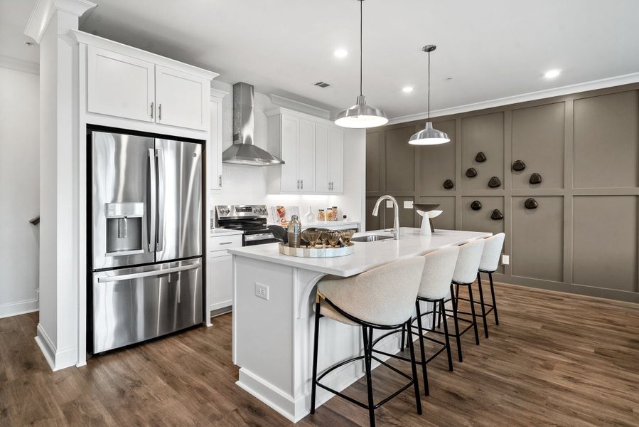 Representative furnished interior of a home built from the The Magnolia by The Providence Group in Market Square at Sawnee Village, Cumming (Image 27).