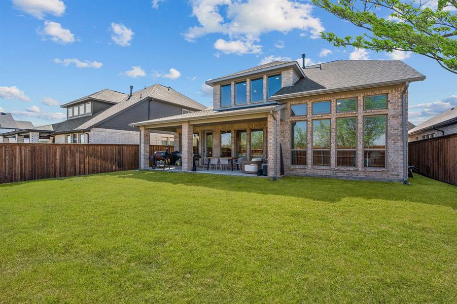 Exterior details and patio area of a home in Walsh, Fort Worth (Image 23).