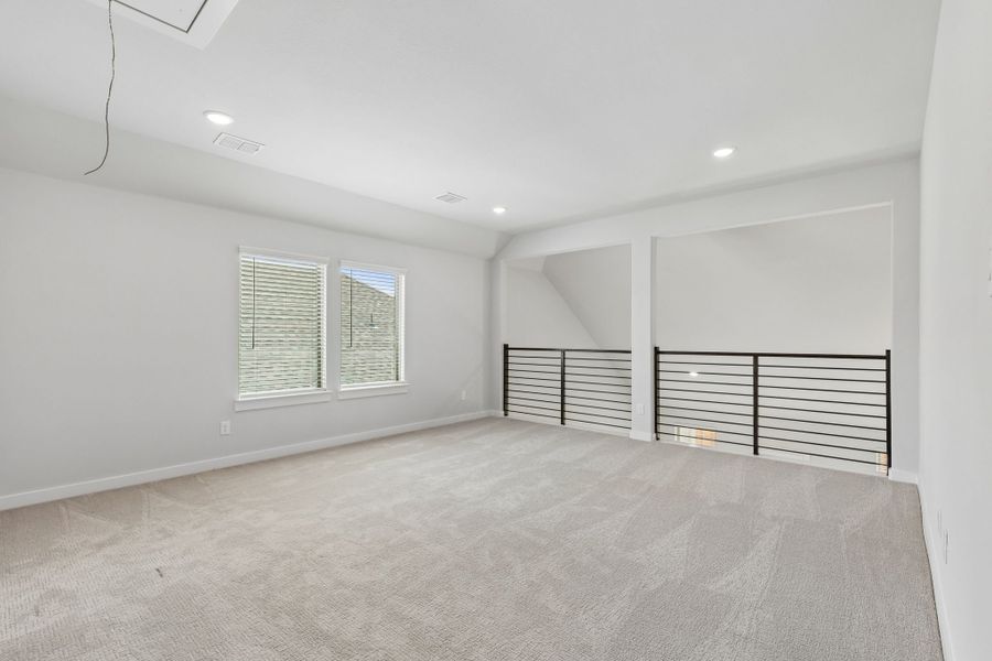 Game Room in the Winters home plan by Trophy Signature Homes – REPRESENTATIVE PHOTO
