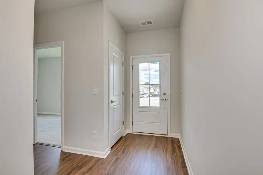 Spacious, unfurnished interior of a new home in The Beacon at Old Peachtree Single Family Homes, Lawrenceville (Image 382).