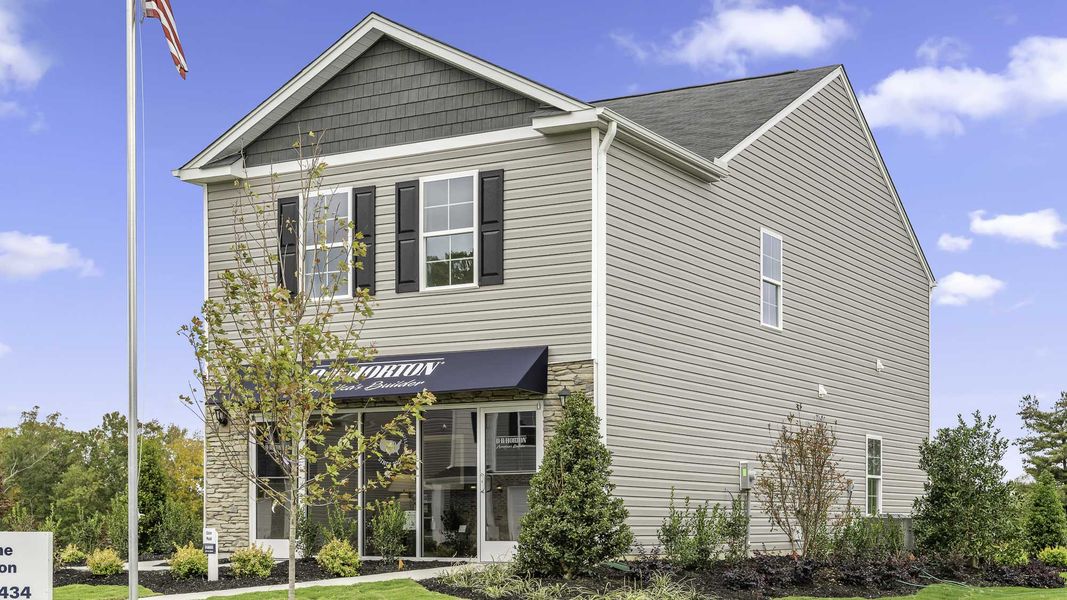 Front exterior of a new home in Willow Mill, Thomasville, NC, highlighting curb appeal (Image 1). Front exterior of a new home in Willow Mill, Thomasville, NC, highlighting curb appeal (Image 1).