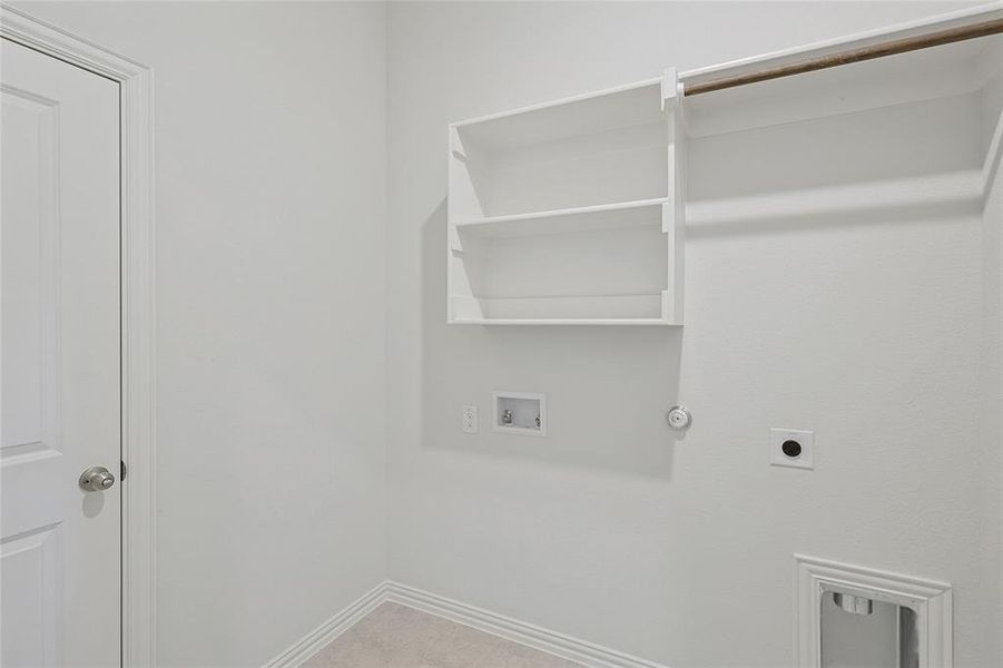 Laundry area featuring hookup for a washing machine, hookup for a gas dryer, and hookup for an electric dryer