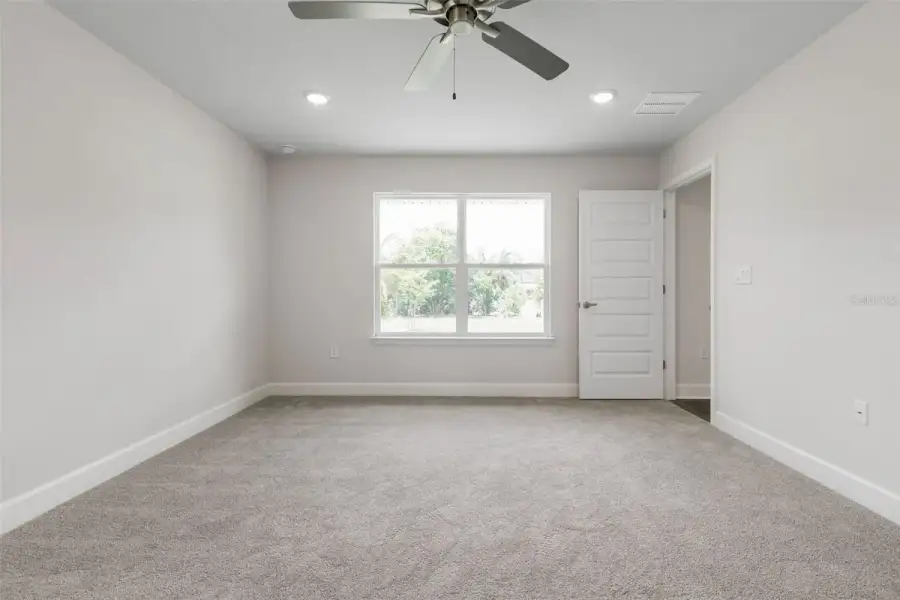 Representative unfurnished interior of a home built from the 2117 by Adams Homes in Flagler Estates, Hastings (Image 26).
