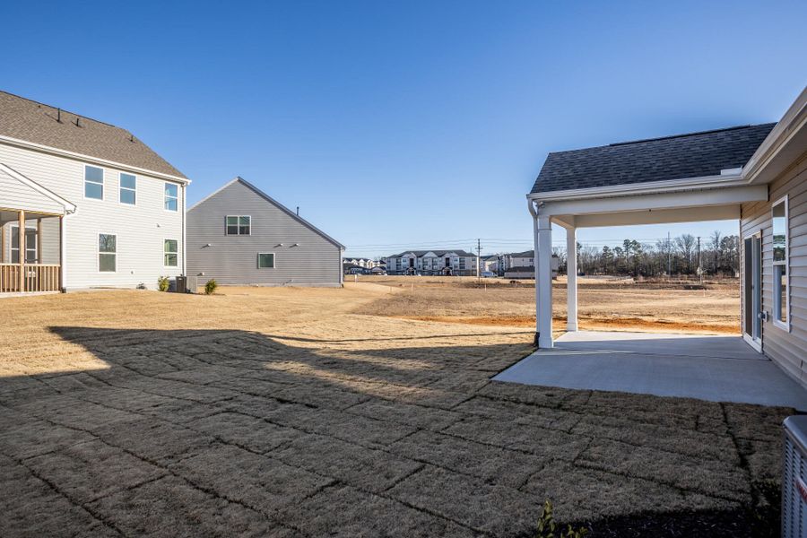 Exterior details and patio area of a home in 1158 Place, Wilson (Image 3).