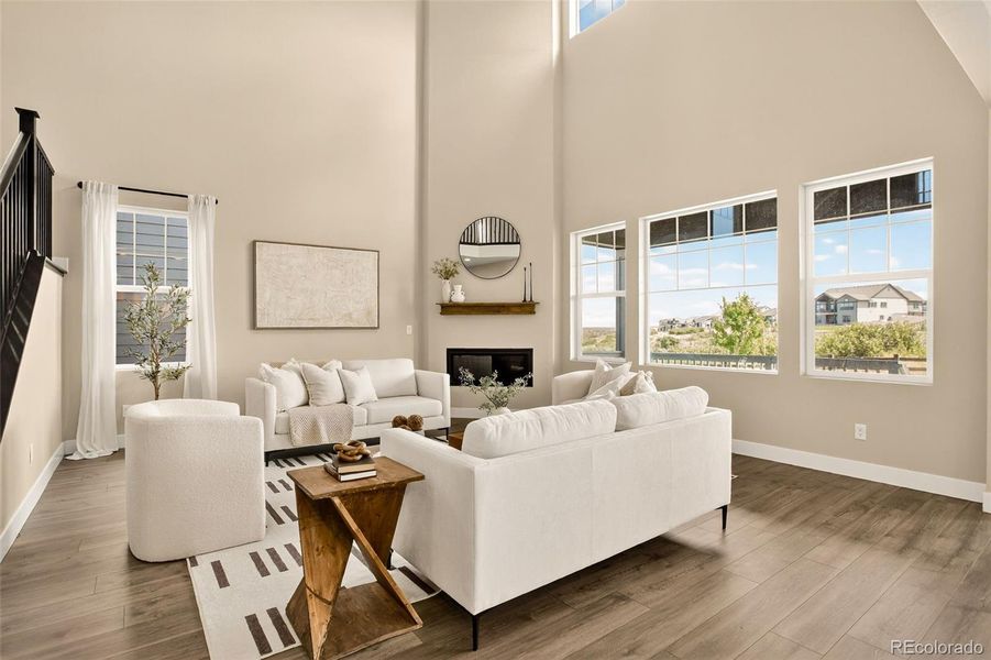 Sizeable great room with vinyl wood plank floors Sizeable great room with vinyl wood plank floors