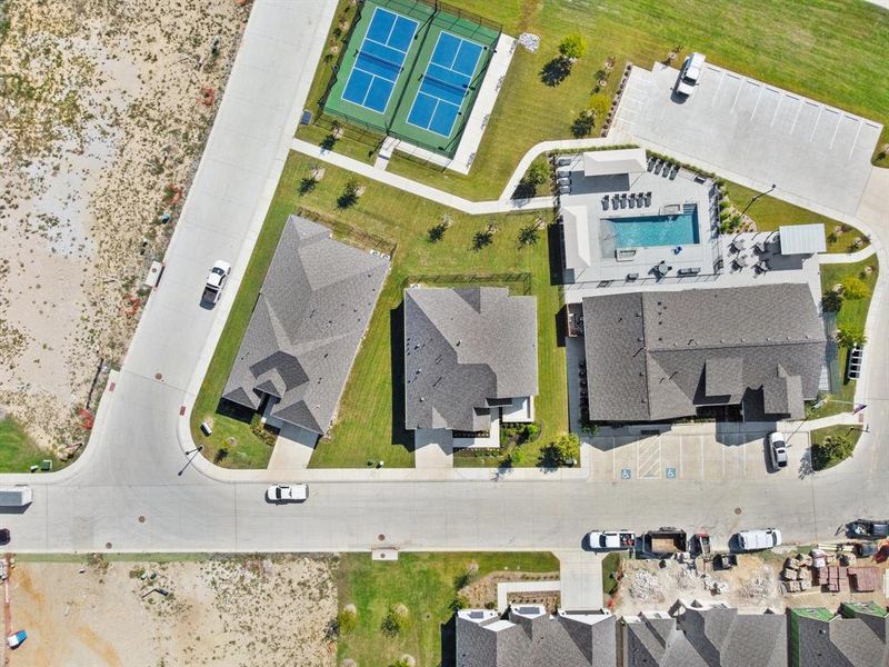 Home is next to pickleball courts, pool, gym, & amenity center!