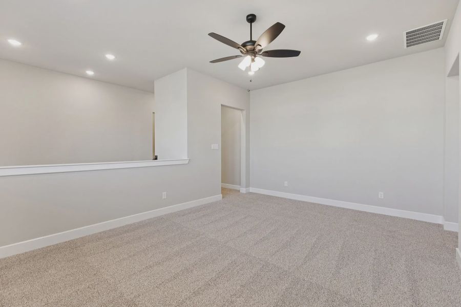 Representative unfurnished interior of a home built from the Windcrest by Chesmar Homes in Talia, Mesquite (Image 18).