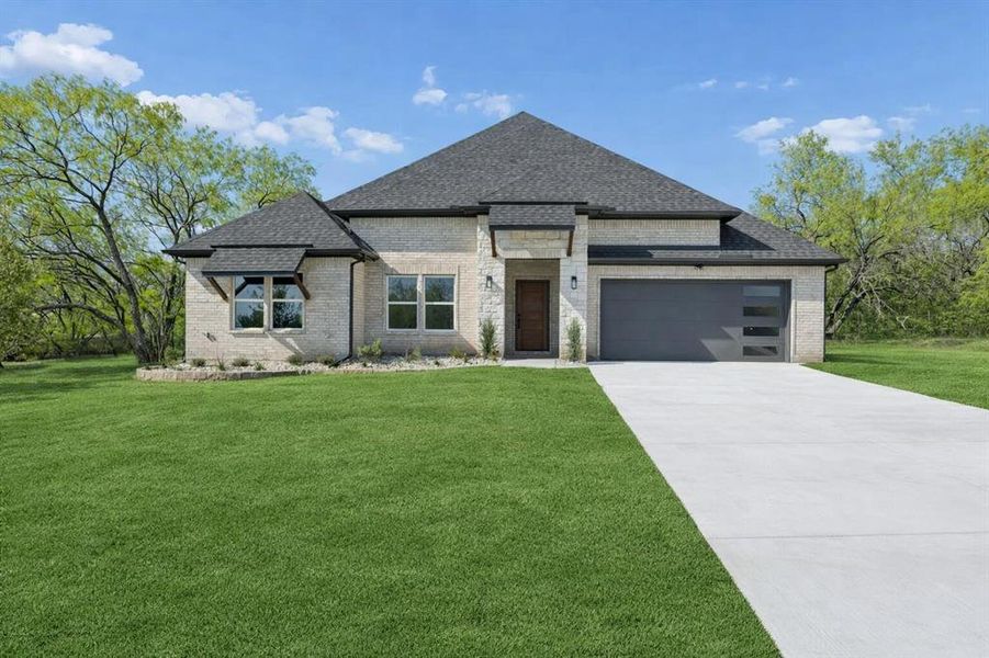 Front exterior of a new home in , Sherman, TX, highlighting curb appeal (Image 1). Front exterior of a new home in , Sherman, TX, highlighting curb appeal (Image 1).