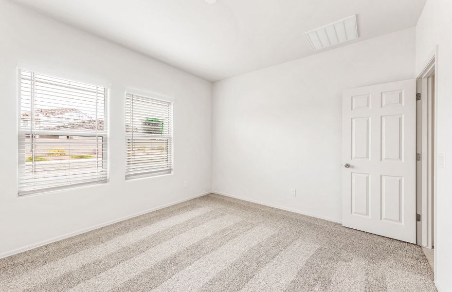 Spacious, unfurnished interior of a new home in Copper Falls, Buckeye (Image 13).