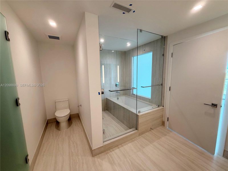 Furnished interior view inside a new home in , North Miami (Image 15). Furnished interior view inside a new home in , North Miami (Image 15).