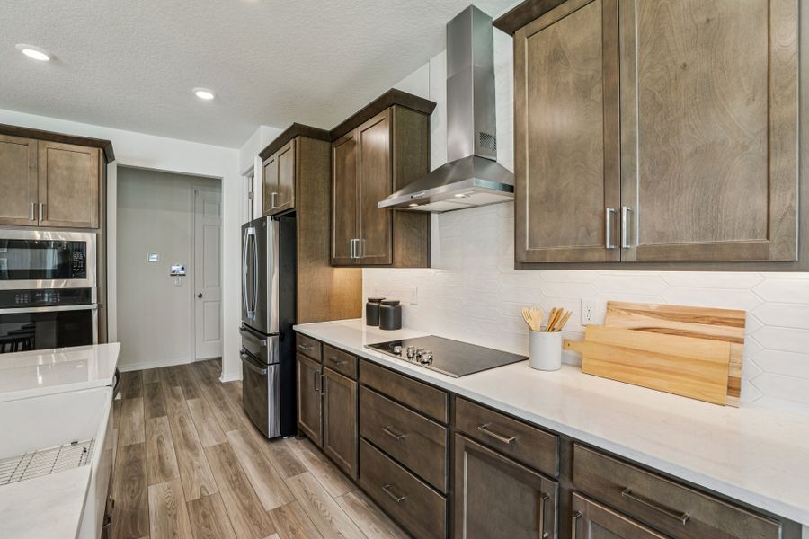 Representative furnished interior of a home built from the Briella by Risewell Homes in Country Club Estates, Palm Bay (Image 11).