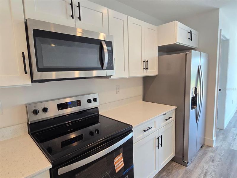 Furnished interior view inside a new home in , Port Charlotte (Image 11).