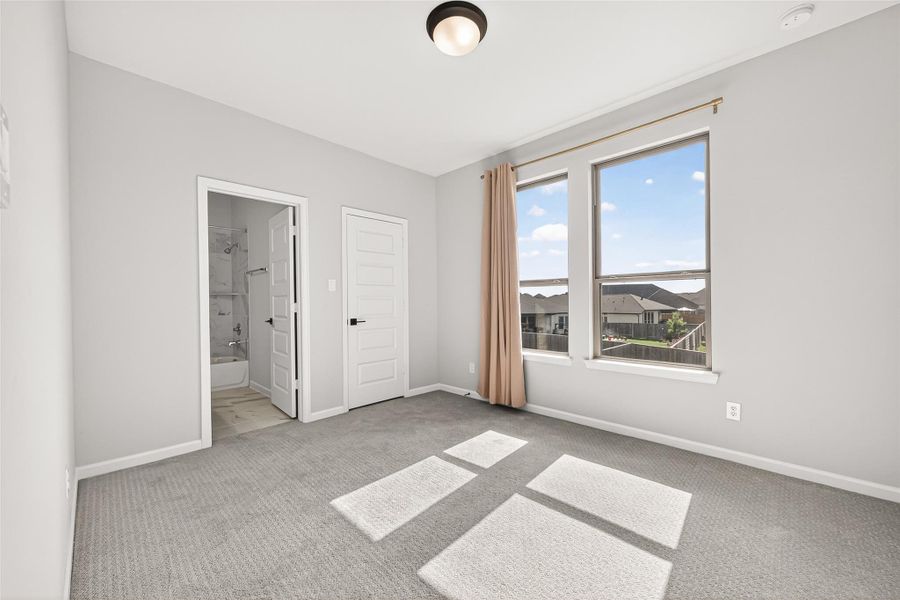 Spacious, unfurnished interior of a new home in Cane Island, Katy (Image 31).