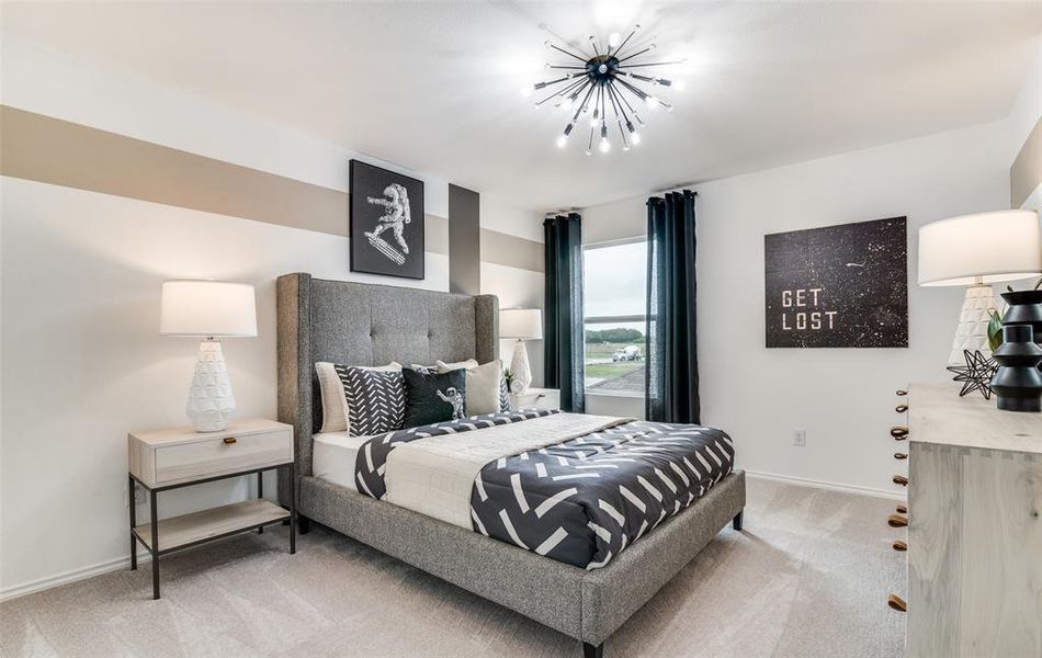 Spacious secondary bedroom with large windows