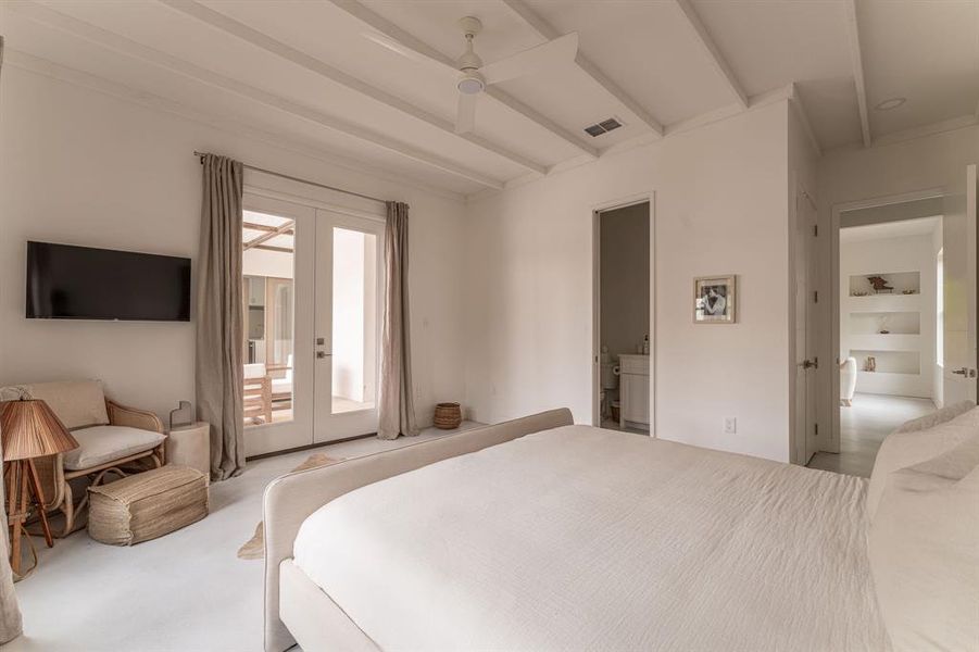 Bedroom featuring finished concrete flooring Bedroom featuring finished concrete flooring